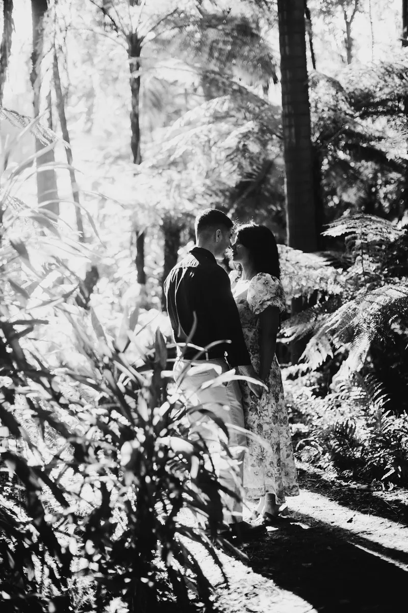 Vanshay and Zahira sharing a quiet moment among the ferns