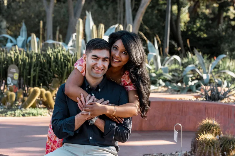 Vanshay and Zahira smiling together in the cactus garden